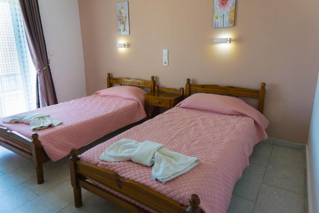 Postel nebo postele na pokoji v ubytování Venus Apartments