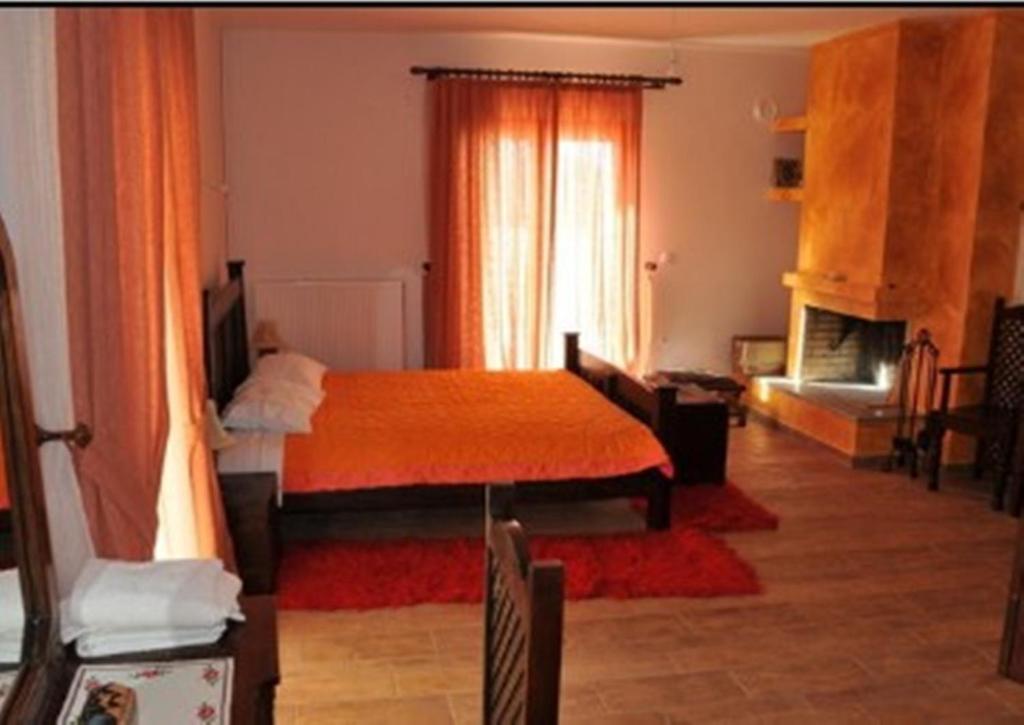 Postel nebo postele na pokoji v ubytování Flygonion Guesthouse