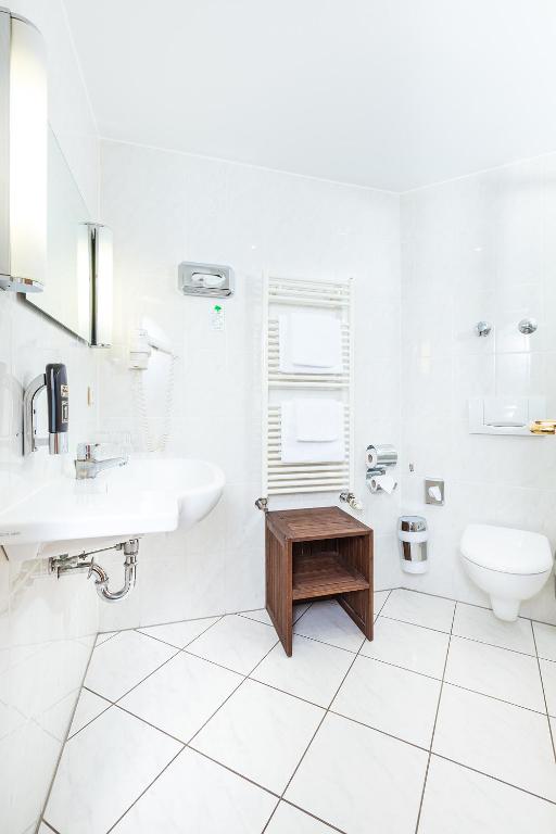 Koupelna v ubytování Hotel Servatius