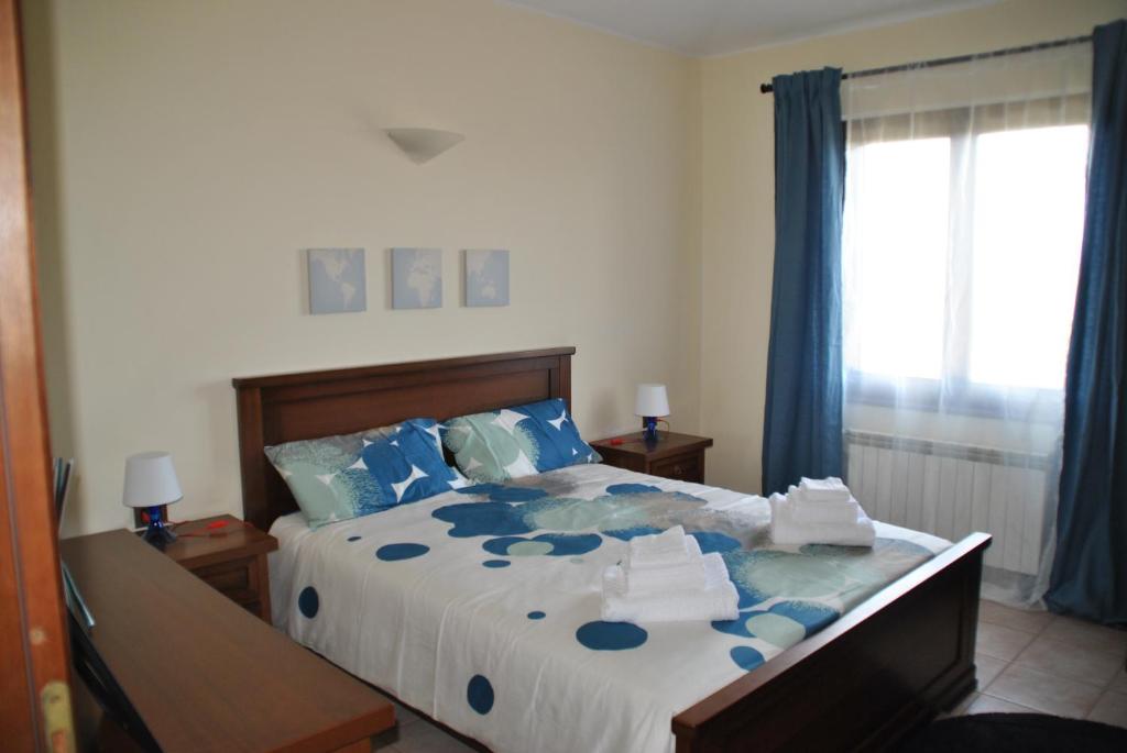Postel nebo postele na pokoji v ubytování Casa Sa serra