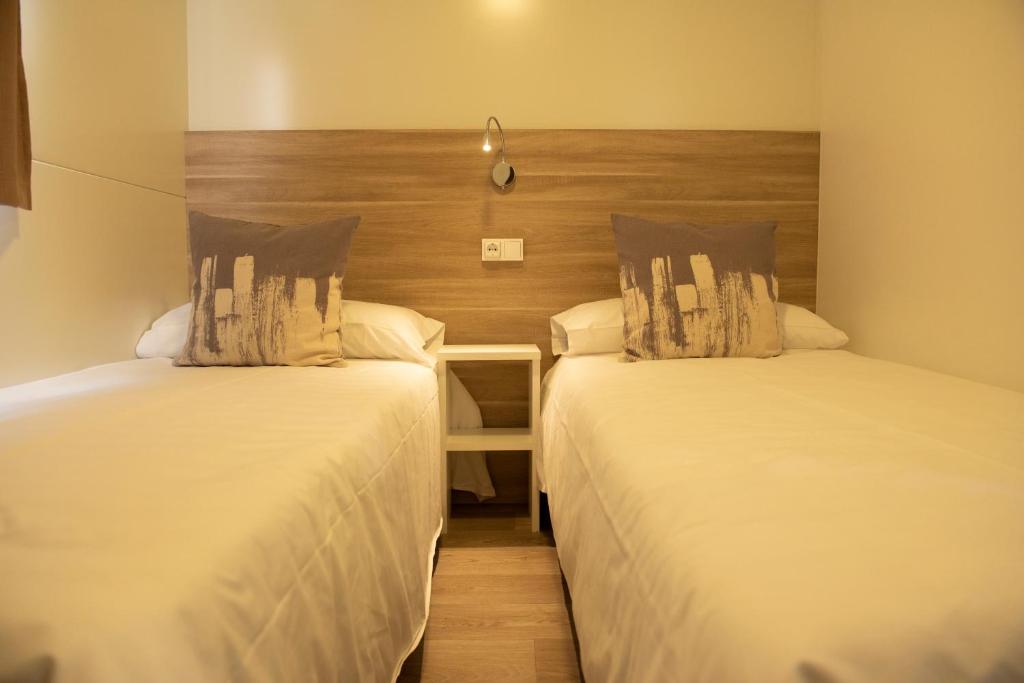 Postel nebo postele na pokoji v ubytování La Noguera Camping
