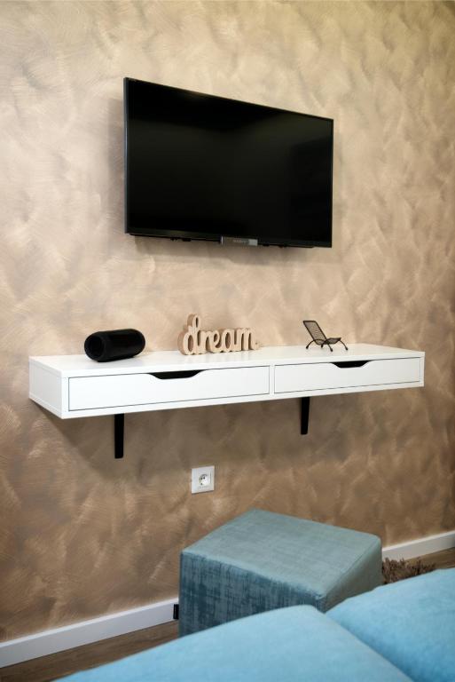 TV a/nebo společenská místnost v ubytování Guest House Laura