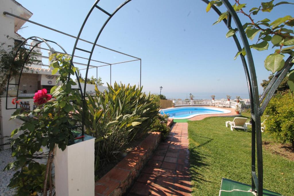 Bazén v ubytování Villa Rosario SpainSunRentals 1070 nebo v jeho okolí
