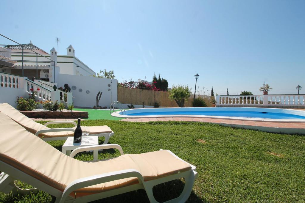Bazén v ubytování Villa Rosario SpainSunRentals 1070 nebo v jeho okolí