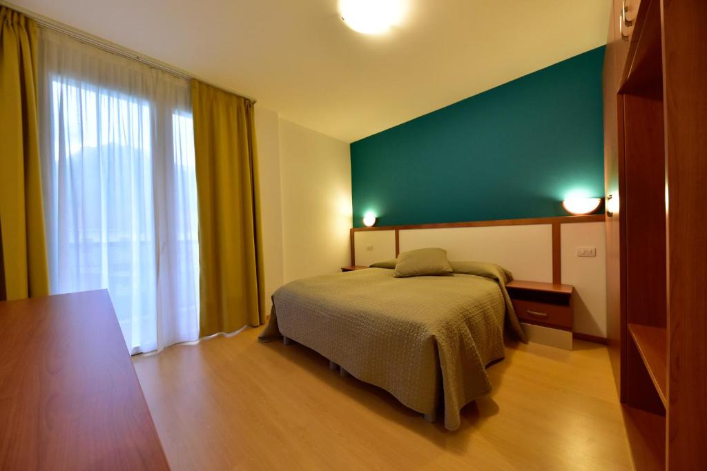Postel nebo postele na pokoji v ubytování Hotel La Pieve