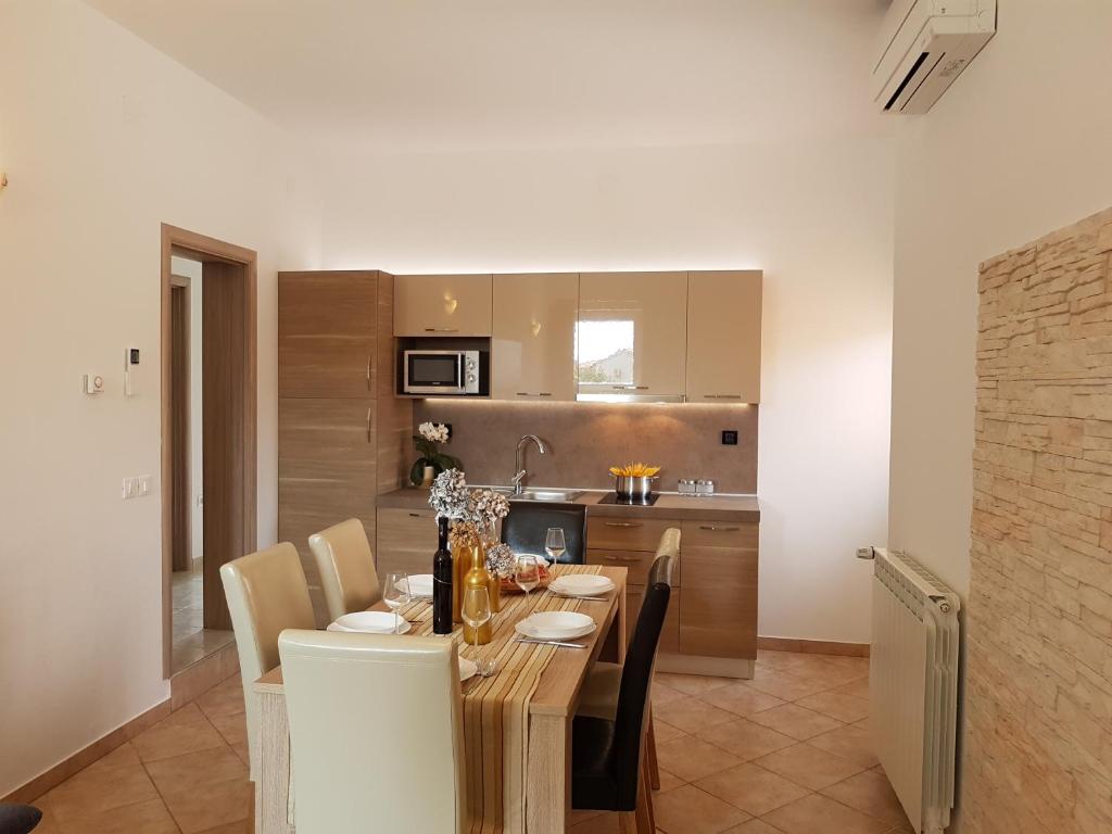 Kuchyň nebo kuchyňský kout v ubytování Apartment Taja