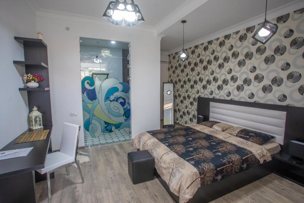 Postel nebo postele na pokoji v ubytování Hotel Paradise Road