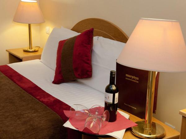 Letto o letti in una camera di Murphys of Killarney