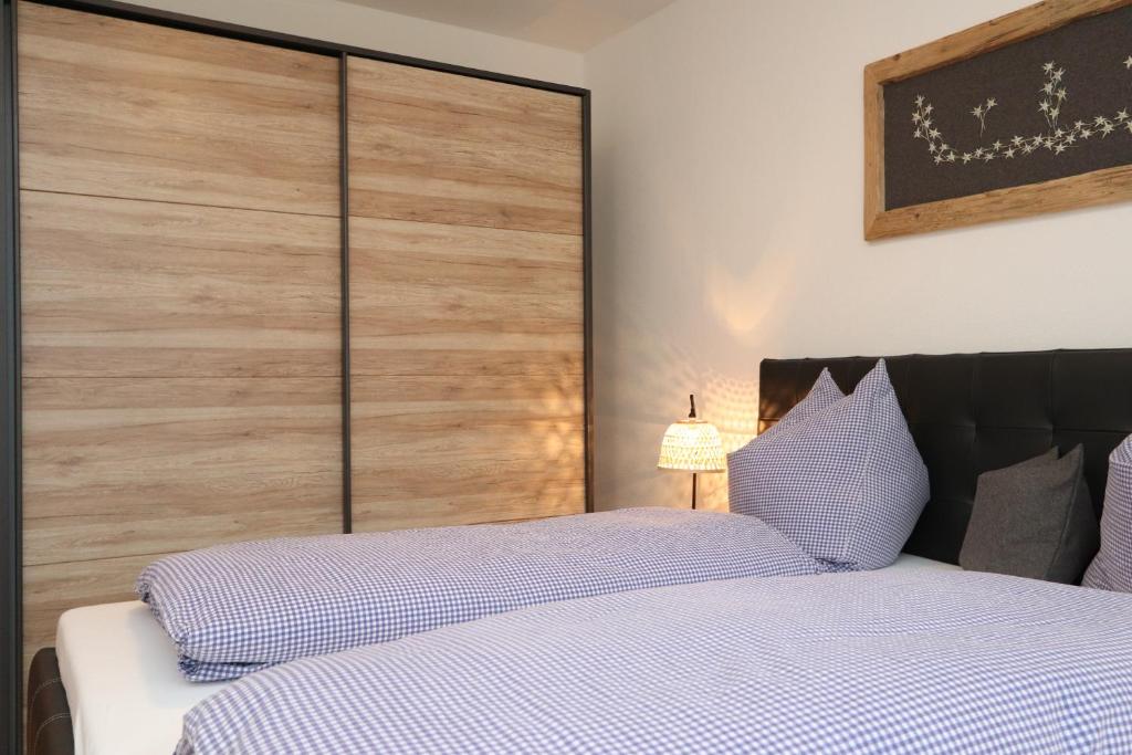 Postel nebo postele na pokoji v ubytování Appartement Hänsel & Gretel