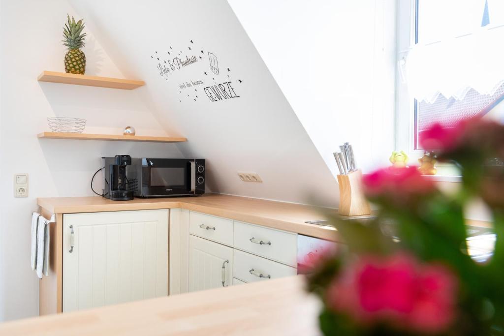 Kuchyň nebo kuchyňský kout v ubytování Ferienwohnung Mittendrin