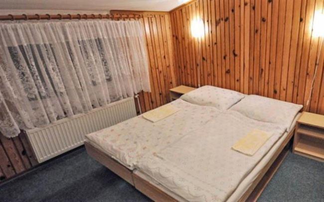 Postel nebo postele na pokoji v ubytování Vila Hana