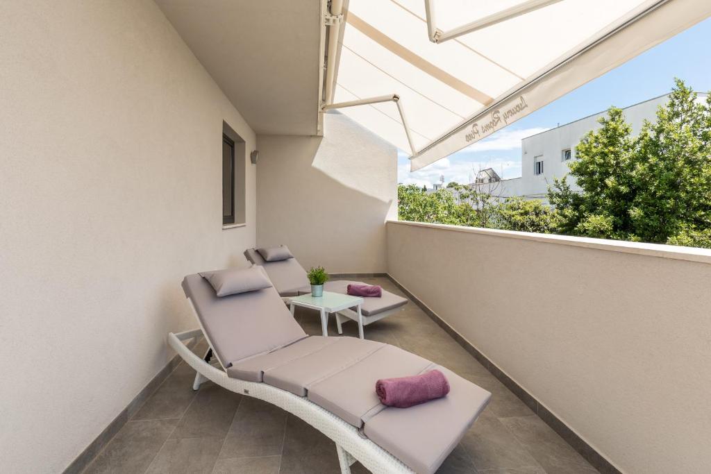 Balkón alebo terasa v ubytovaní Luxury Rooms Pino
