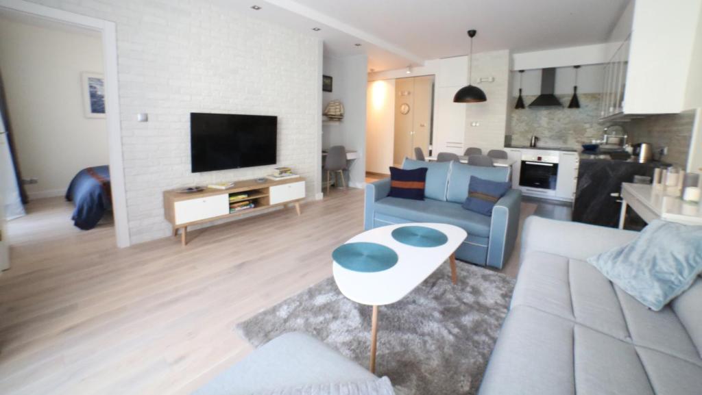 Kuchyňa alebo kuchynka v ubytovaní ASKI New Powiśle Copernicus Apartment