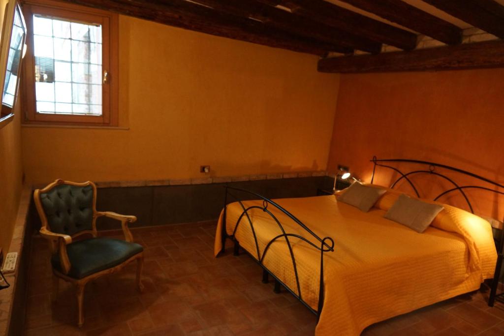 Postel nebo postele na pokoji v ubytování Casa delle gondole