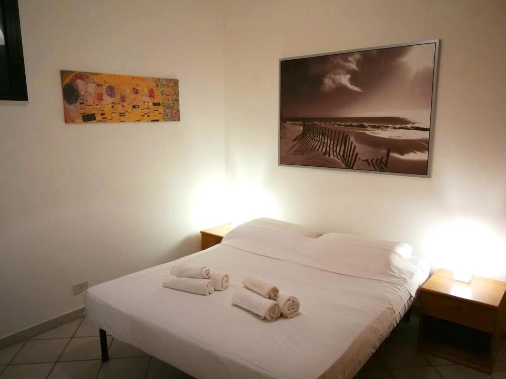Postel nebo postele na pokoji v ubytování Appartamento La Cava