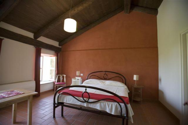 Postel nebo postele na pokoji v ubytování Agriturismo Camisassi