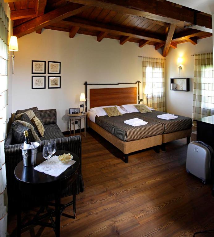 Postel nebo postele na pokoji v ubytování Hotel Fossa Mala