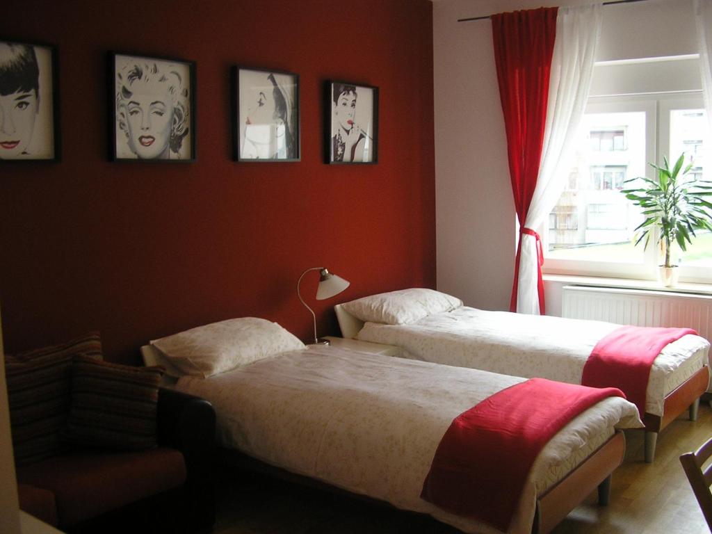 Postel nebo postele na pokoji v ubytování Celic Art Apartments