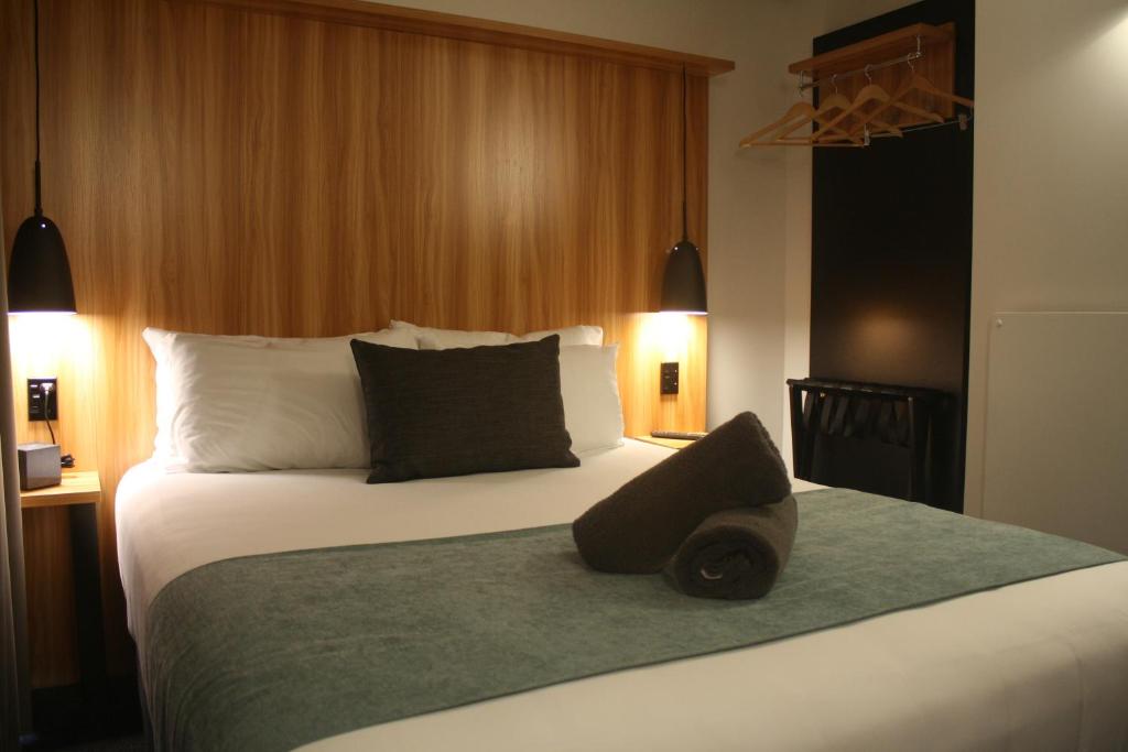Postel nebo postele na pokoji v ubytování No. 9 Hotel