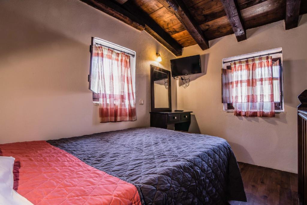 Postel nebo postele na pokoji v ubytování Psamathous Guesthouse