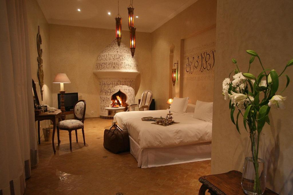 Postel nebo postele na pokoji v ubytování Demeures d'Orient Riad & Spa