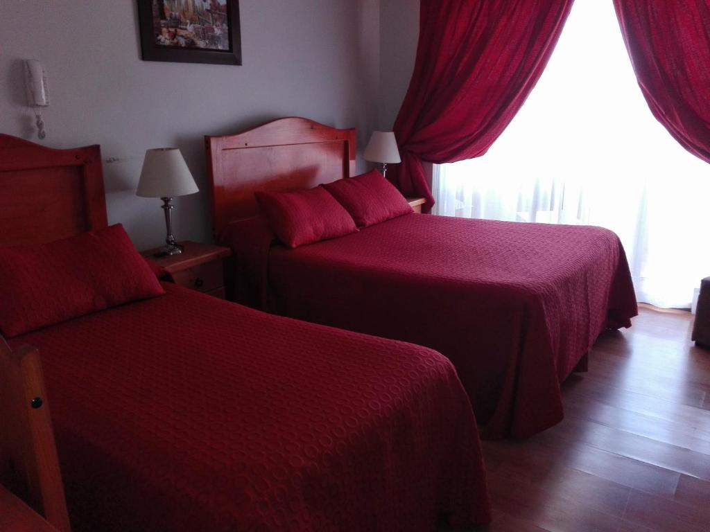 Letto o letti in una camera di Hotel Solaris