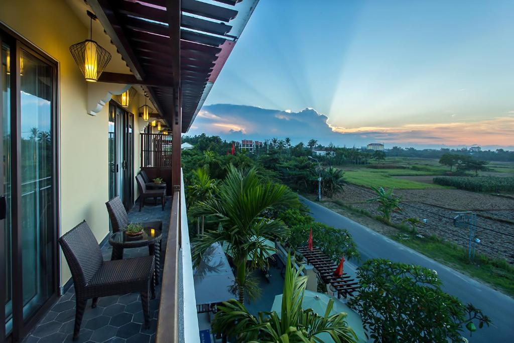 Balkón nebo terasa v ubytování Hoi An Field Boutique Resort & Spa
