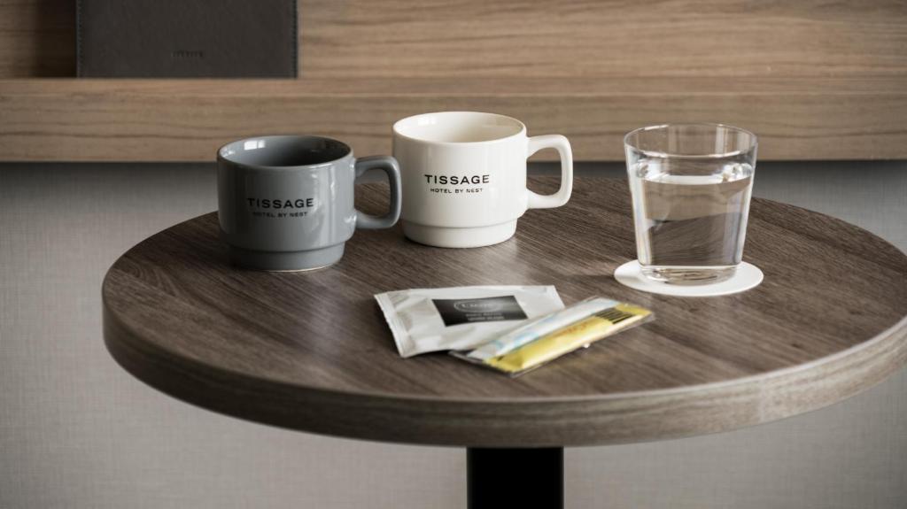 Příslušenství pro přípravu čaje a kávy v ubytování Tissage Hotel Naha by Nest