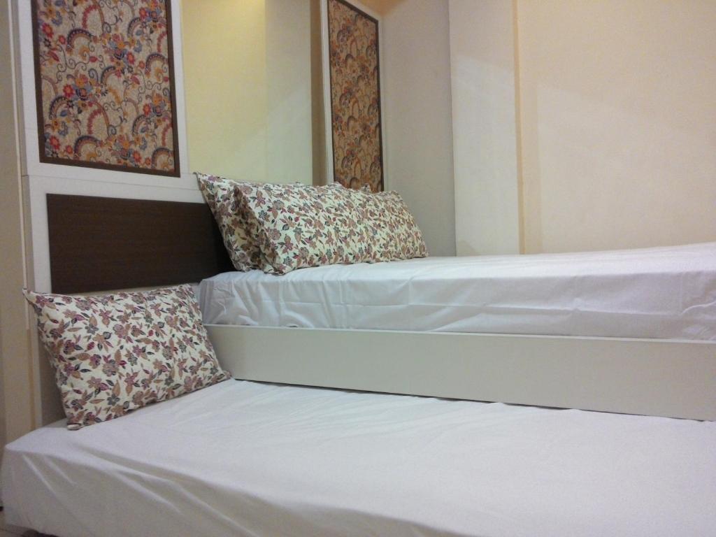 Postel nebo postele na pokoji v ubytování Kantos Guest House