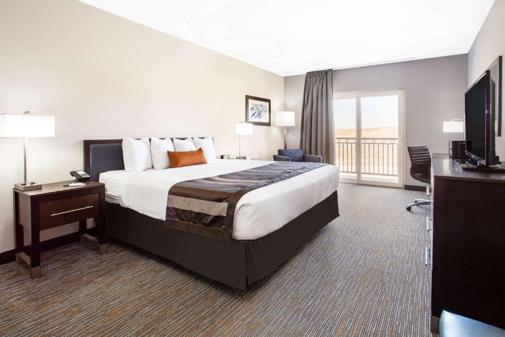 Ein Bett oder Betten in einem Zimmer der Unterkunft Wingate by Wyndham Page Lake Powell