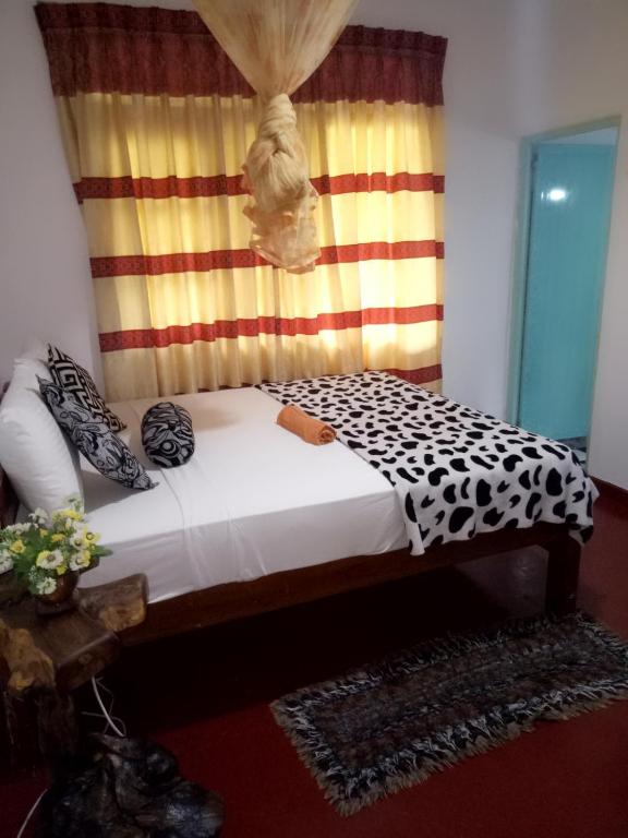 Postel nebo postele na pokoji v ubytování Tunnel Gap Homestay