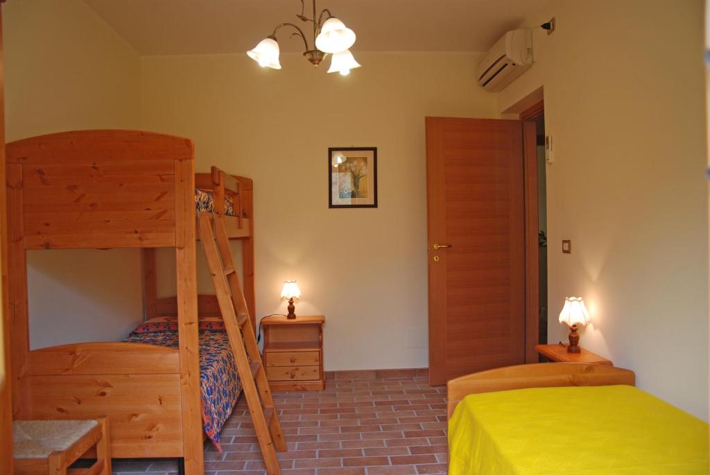 Postel nebo postele na pokoji v ubytování Lido Camping Village