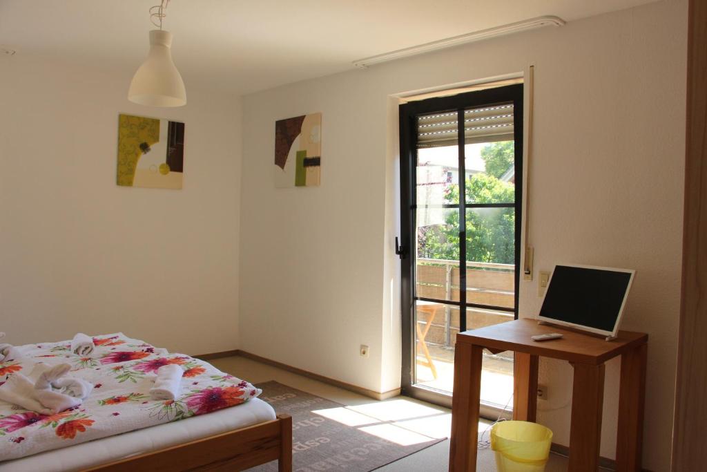 Postel nebo postele na pokoji v ubytování Gasthof Gruner Baum