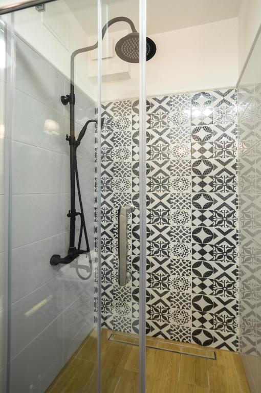 Kúpeľňa v ubytovaní Basilica Apartment Mariacka Gdansk