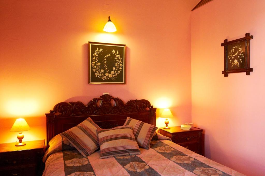 Postel nebo postele na pokoji v ubytování Iapetos Village