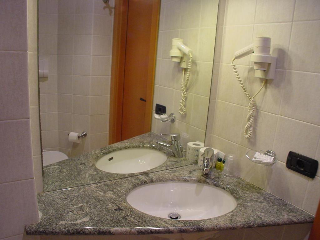 Koupelna v ubytování Hotel Don Abbondio