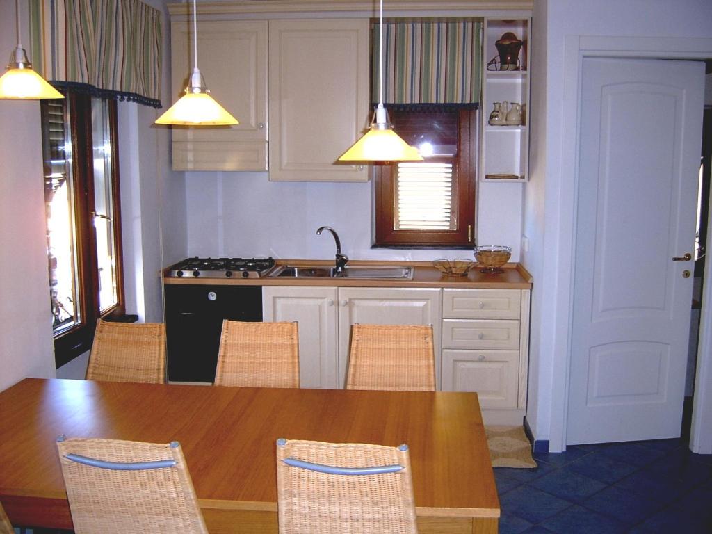 Kuchyň nebo kuchyňský kout v ubytování Casa Lorenza