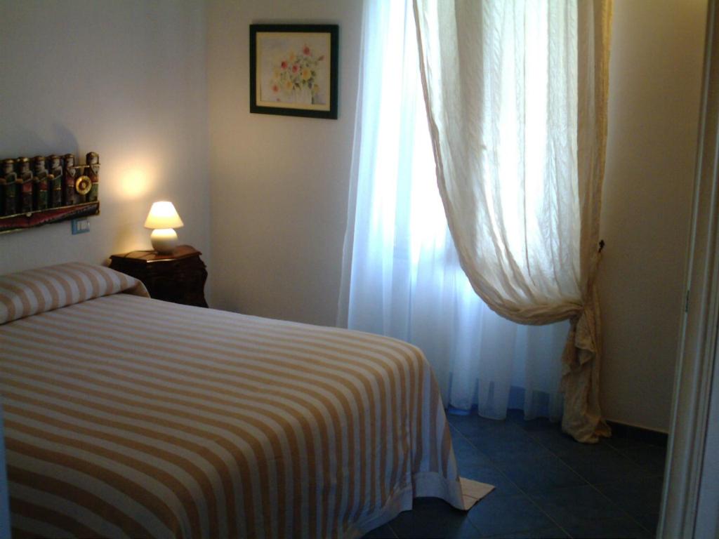 Postel nebo postele na pokoji v ubytování Casa Lorenza