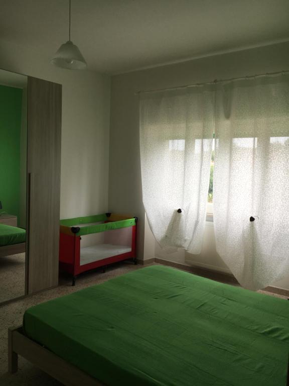 A bed or beds in a room at Mela Verde