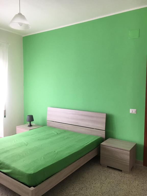 A bed or beds in a room at Mela Verde