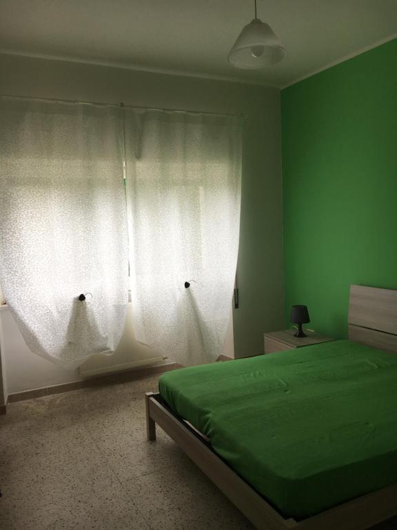 A bed or beds in a room at Mela Verde