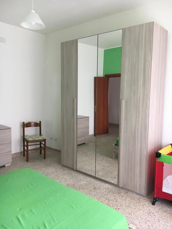 A bed or beds in a room at Mela Verde