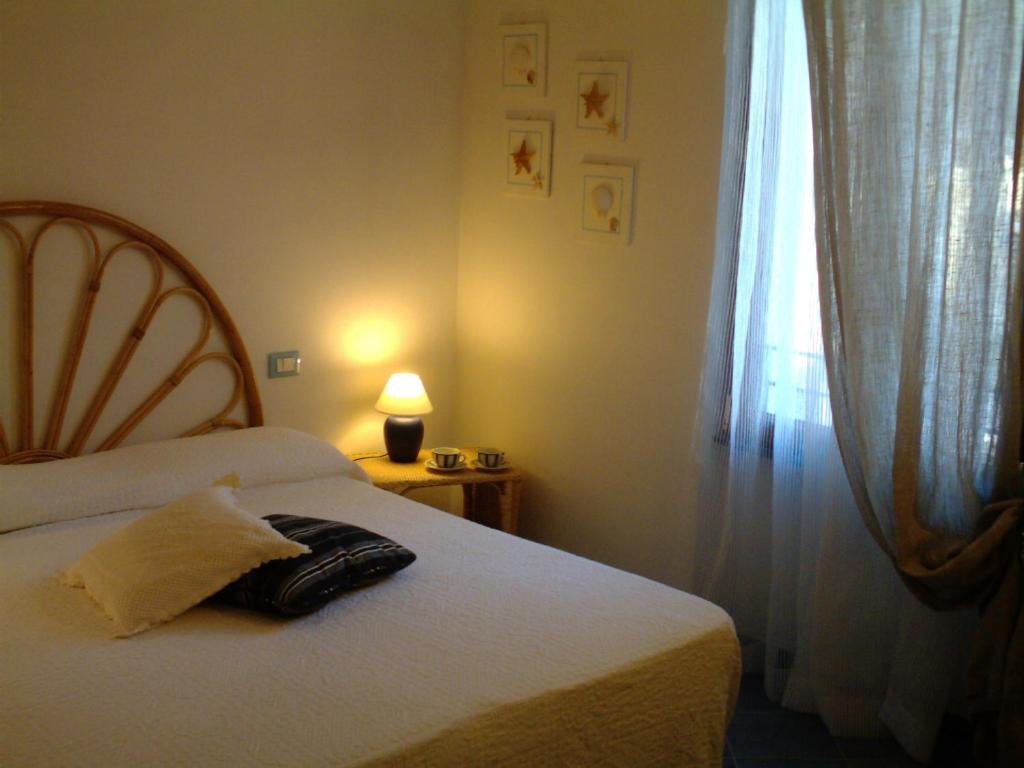 Postel nebo postele na pokoji v ubytování Casa Lorenza