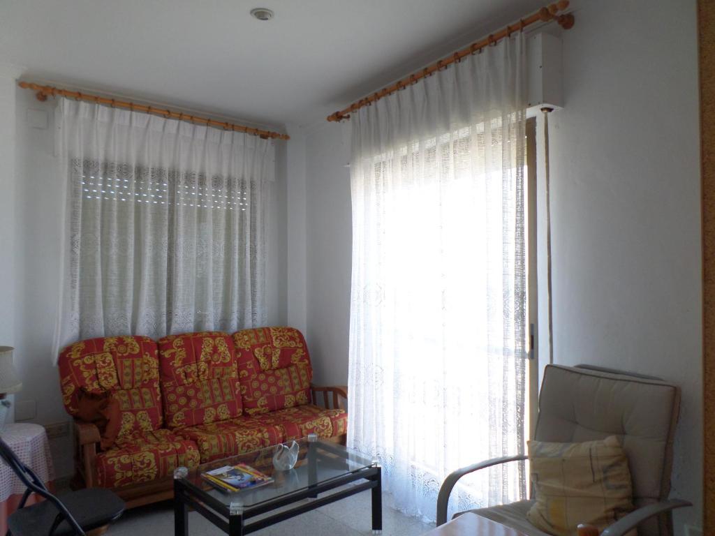 Posedenie v ubytovaní Apartamento primera linea de playa WIFI gratis