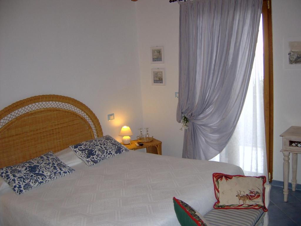 Postel nebo postele na pokoji v ubytování Casa Lorenza