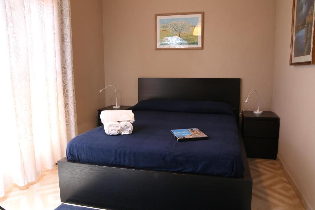 Postel nebo postele na pokoji v ubytování Terra Di Mare