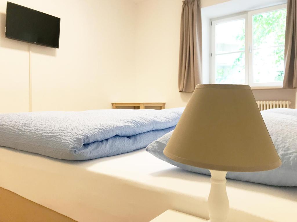 Postel nebo postele na pokoji v ubytování Manzoni Premium