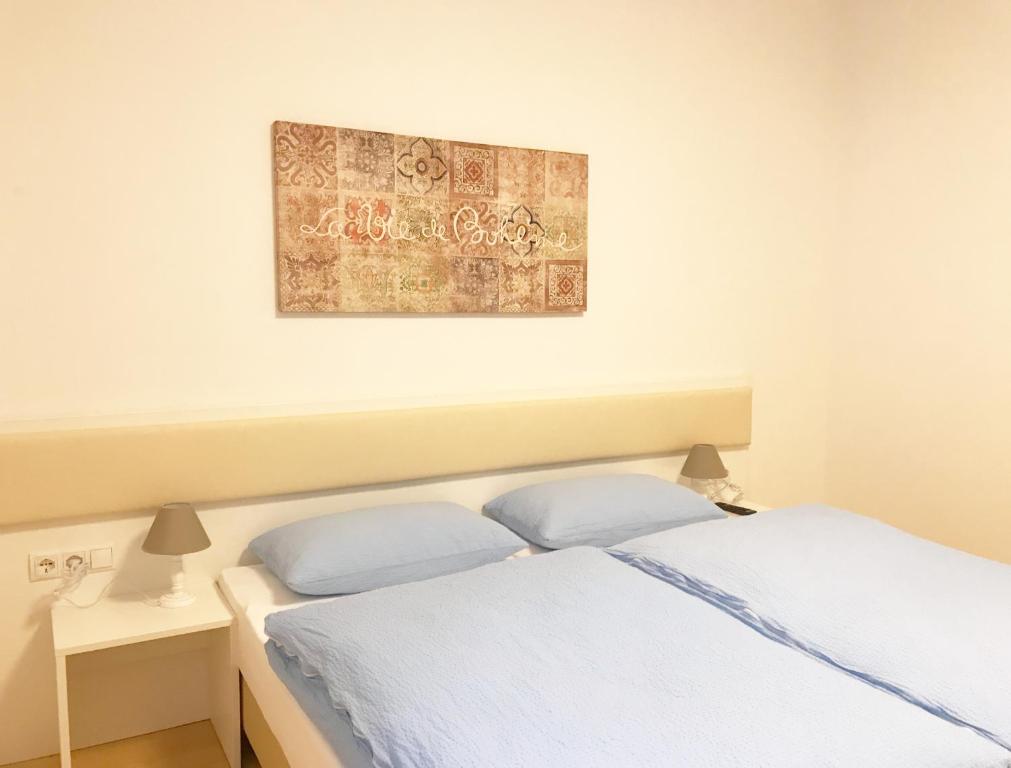 Postel nebo postele na pokoji v ubytování Manzoni Premium