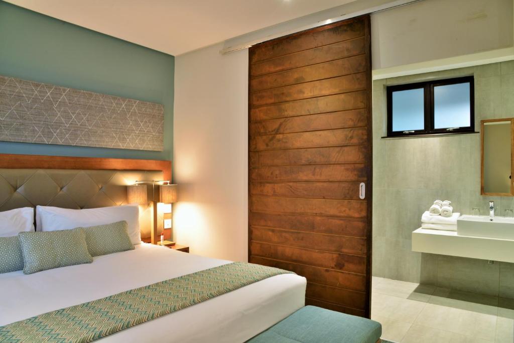 Postel nebo postele na pokoji v ubytování Cresta Maun Hotel