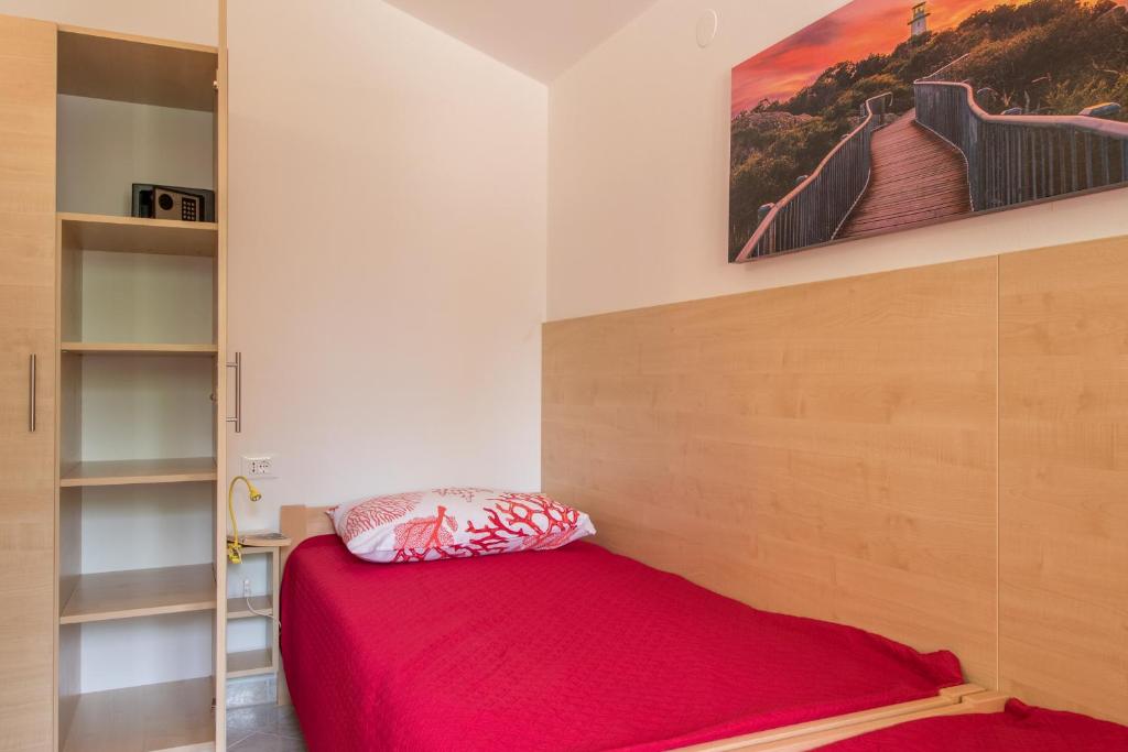 Postel nebo postele na pokoji v ubytování Apartment Taja